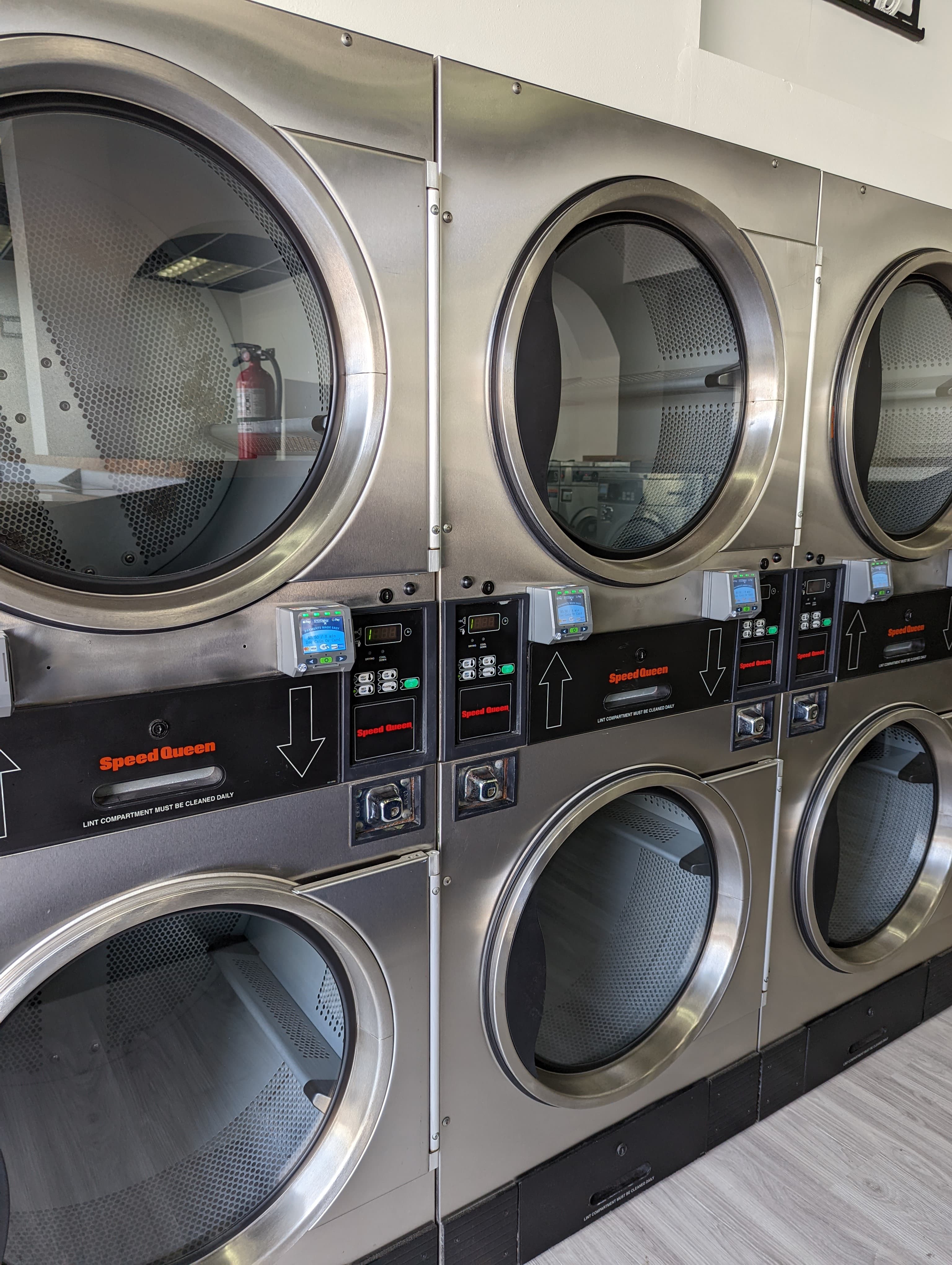 Speed Queen front-load washers at El Porto Laundry's self-service laundromat